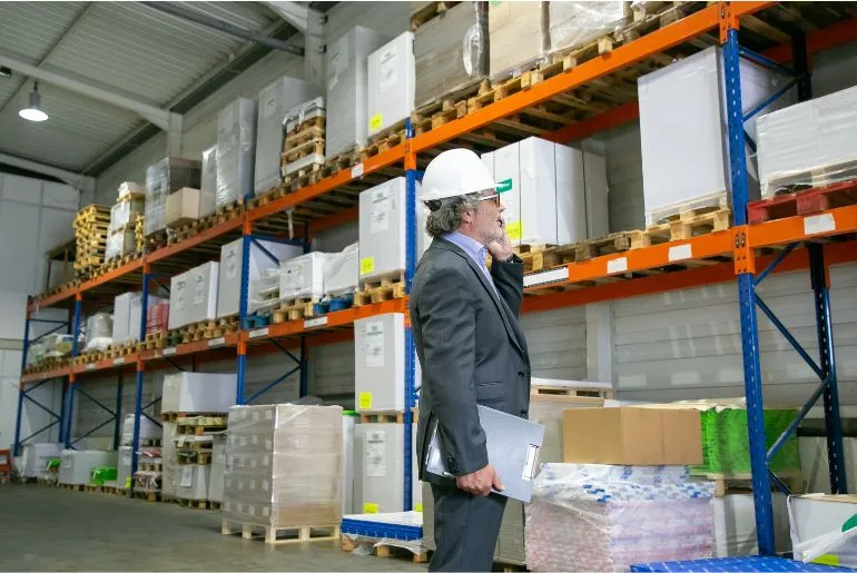 Polwax warehouse interior with stacked industrial products